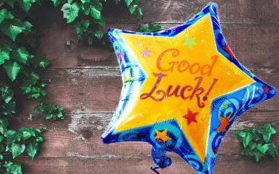 Good luck balloon with a wood panel background